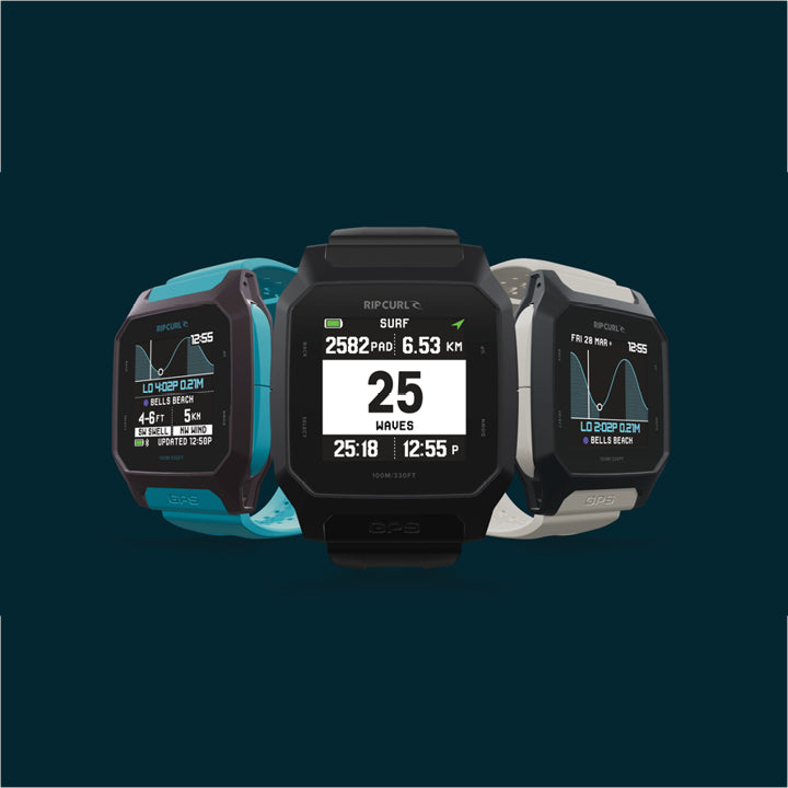 Three smartwatches with digital displays on a dark background