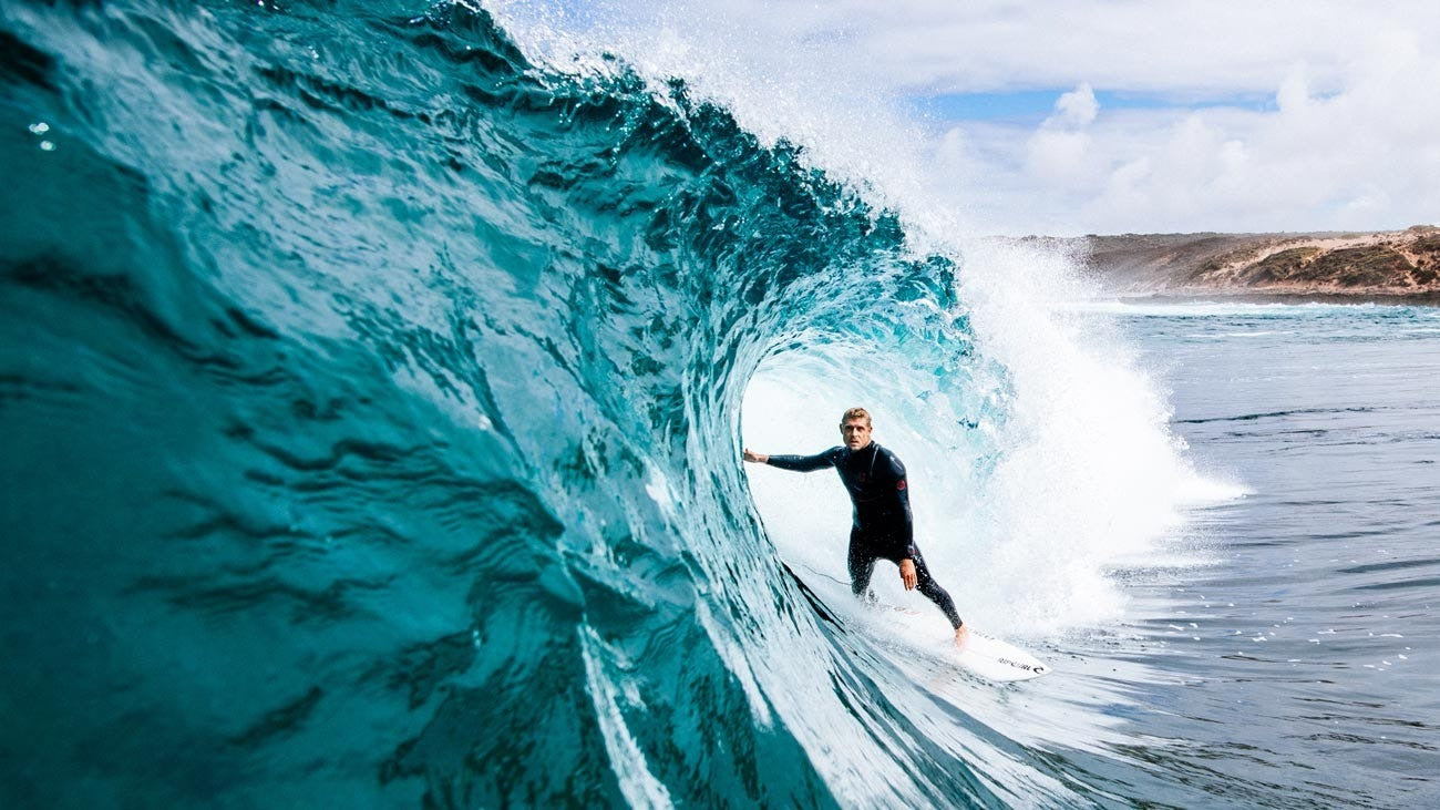 Mick Fanning surfing in the Flashbomb Fusion wetsuit