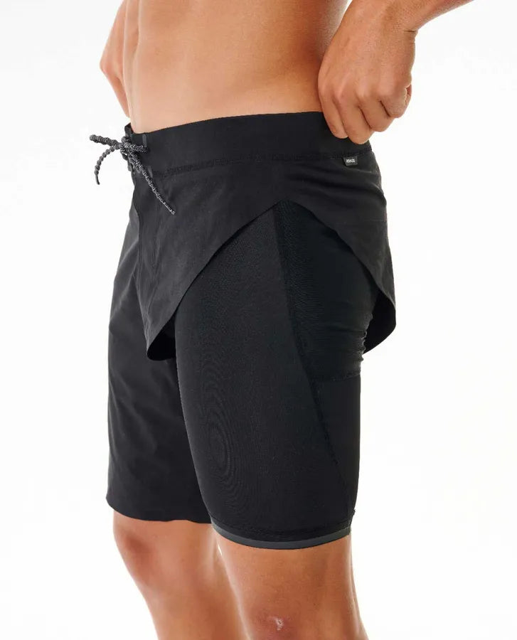 Black athletic shorts with a drawstring on a white background