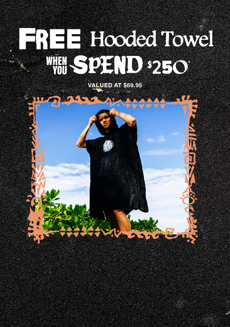 Promotional poster with a person in a hooded towel, text offering a free hooded towel with a minimum spend, on a black background.