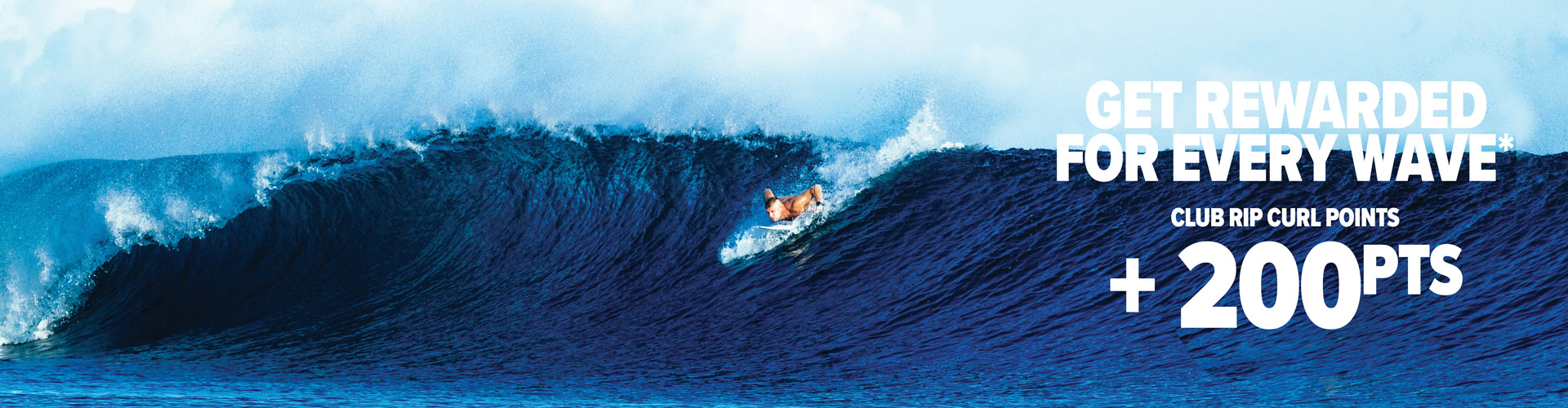 Surfer riding a wave with promotional text about rewards and points system.