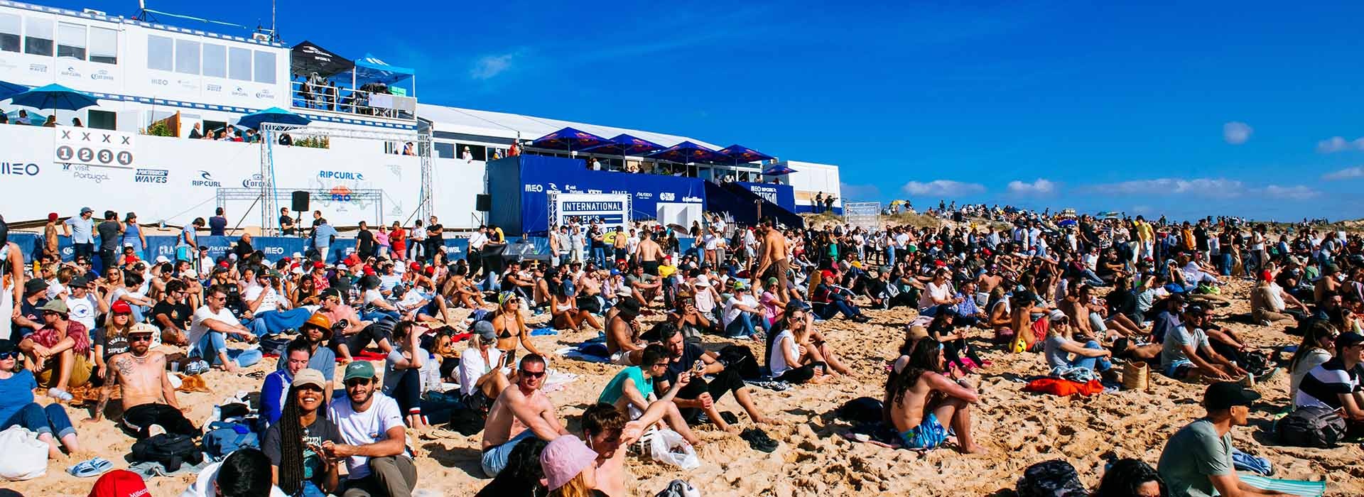 Fans sitting on the beach in Portugal