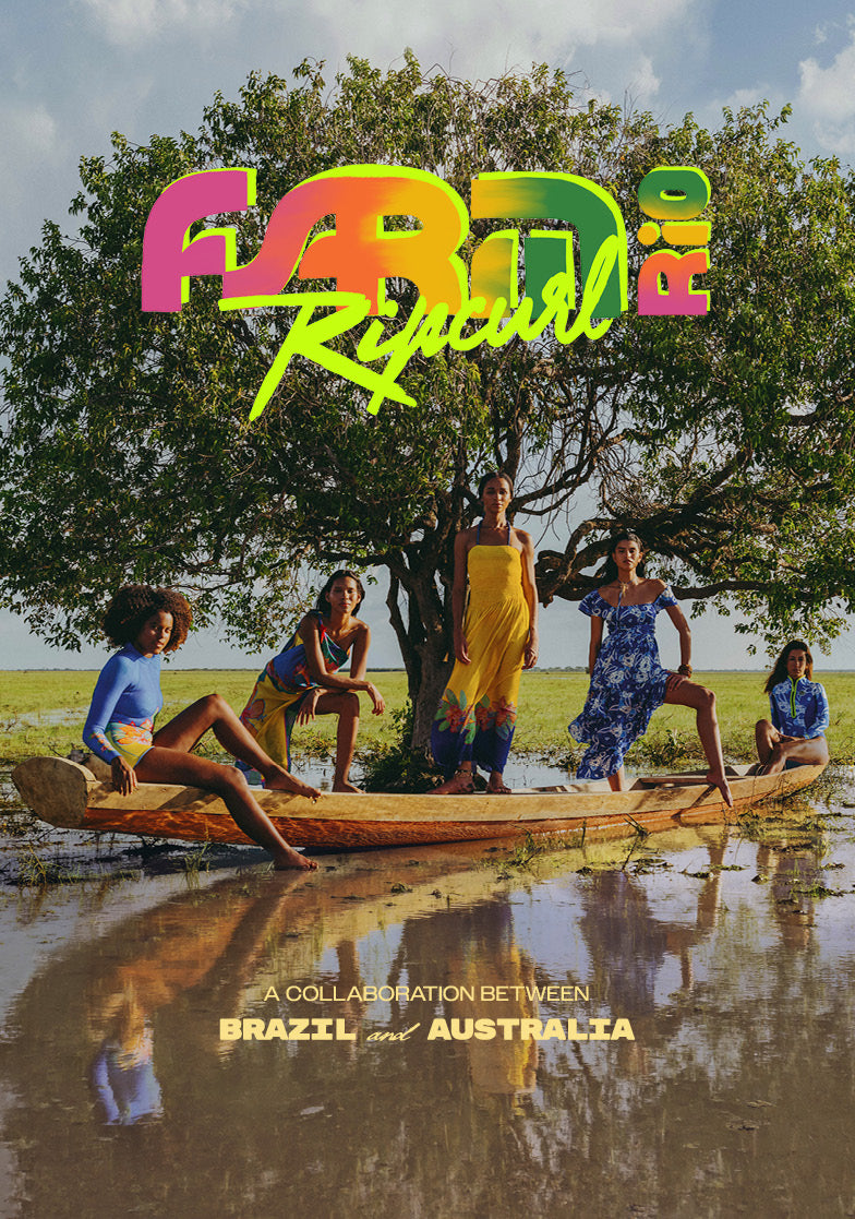 Promotional poster-style image for FSDR Rip Curl, showing five women sitting in a wooden canoe on a muddy shoreline under a large tree, with the FSDR Rip Curl logo across the top and text reading 'A collaboration between Brazil and Australia' near the bottom.