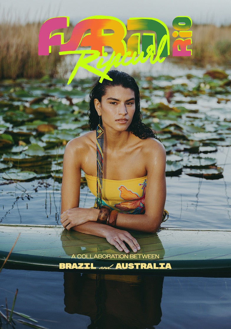 A woman posing in a yellow bikini top at a lily-pad pond, with 'FABDI Rio Rebirth' text overlay and 'A COLLABORATION BETWEEN BRAZIL and AUSTRALIA' text at the bottom.