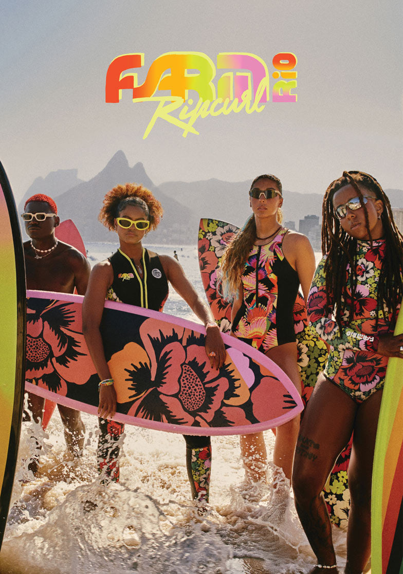 Group of people with surfboards on a beach, wearing colorful outfits and sunglasses, with 'Fame Ripcurl' branding.