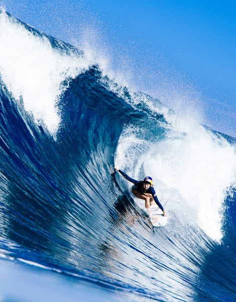 Erin Brooks surfing in Hawaii