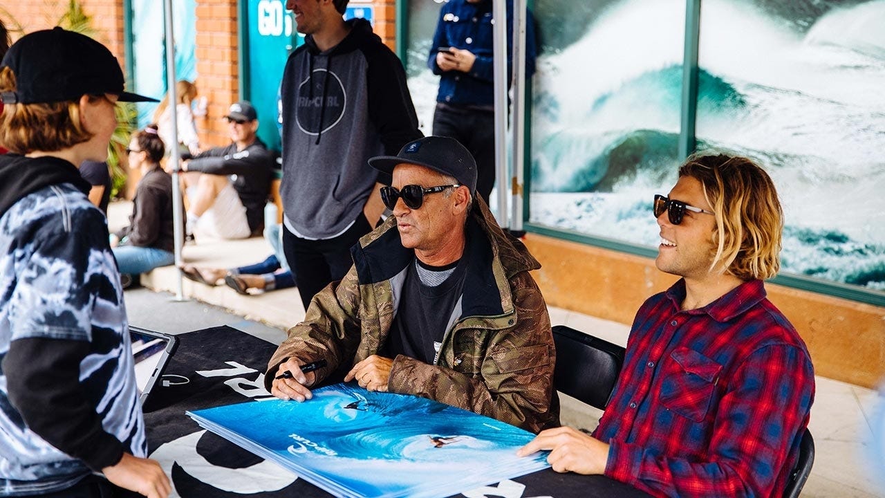 Tom and Conner Signing Posters