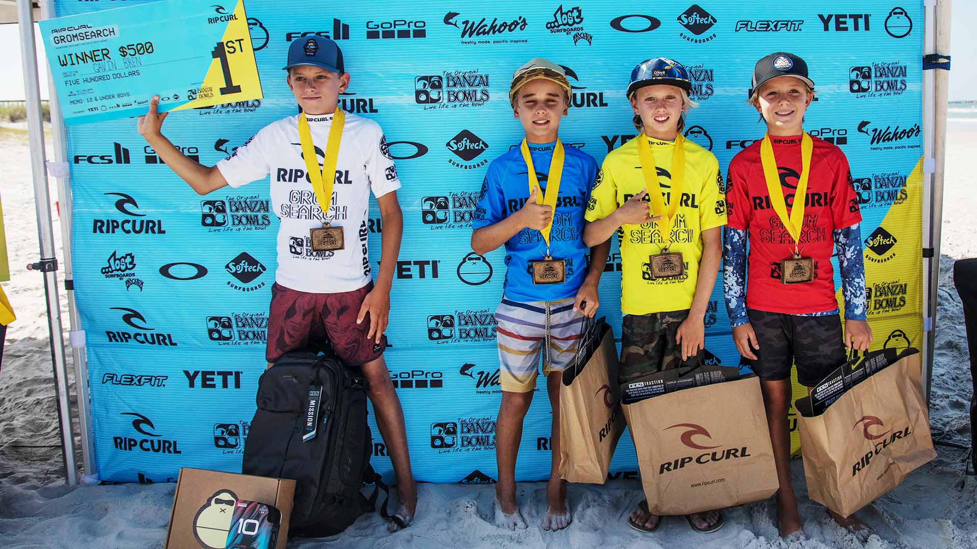 Winners of the 12 and Under Boys rounds with their prizes