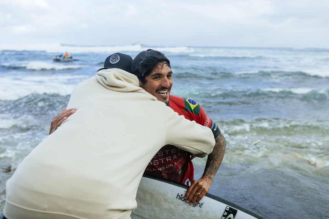 Gabriel Medina hugging a friend after his win