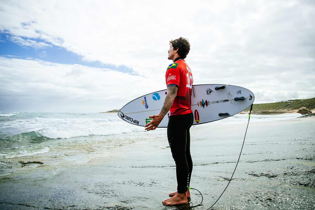 Gabriel Medina taking a moment before entering the water for his heat