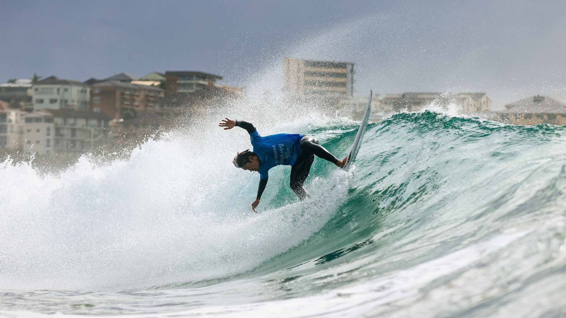 Surfer surfing waves at the Manly Pro in Sydney.