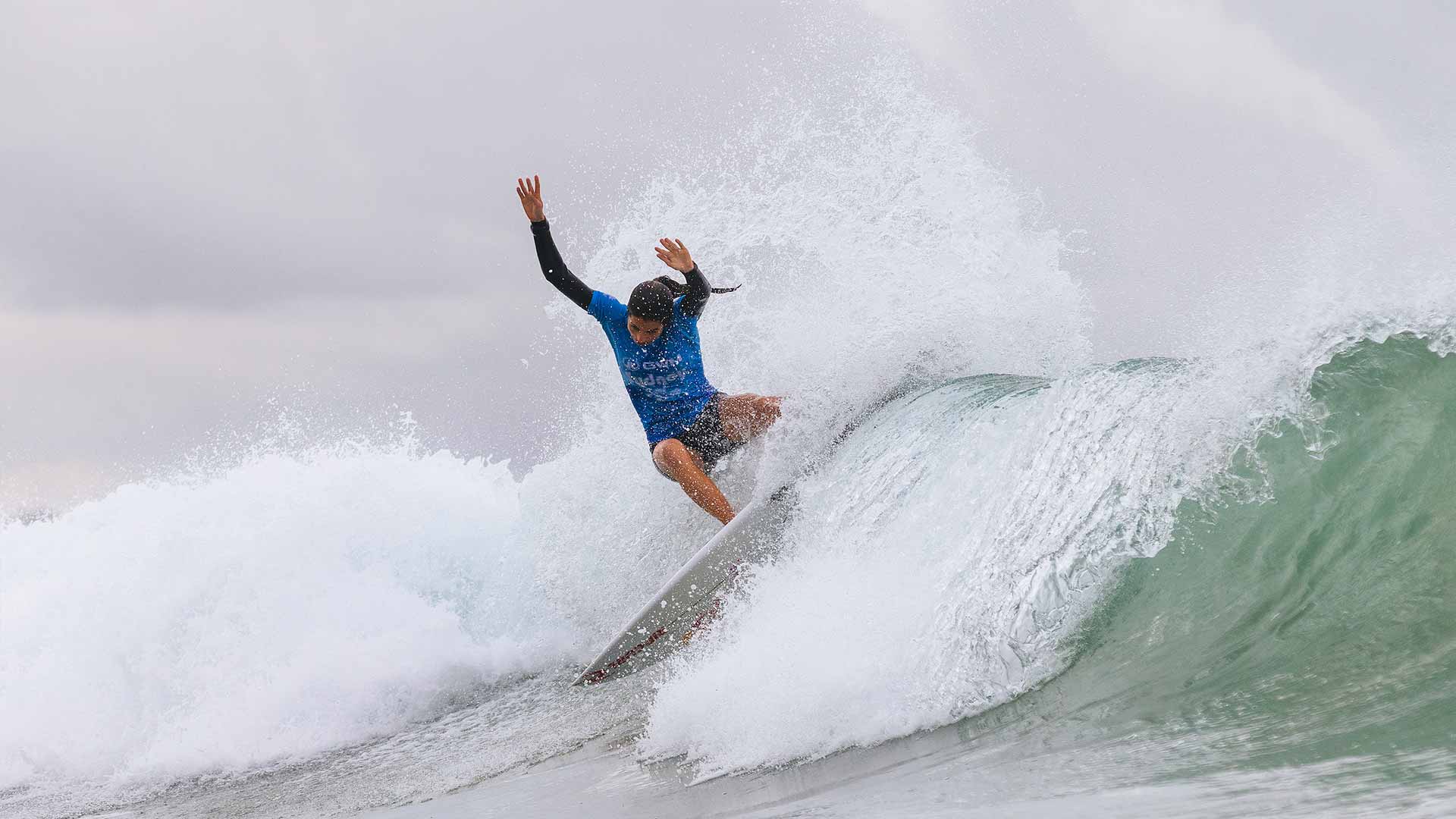 Teresa surfing in her winning heat