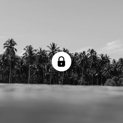 Locked icon overlay on a black and white image of the ocean and trees.