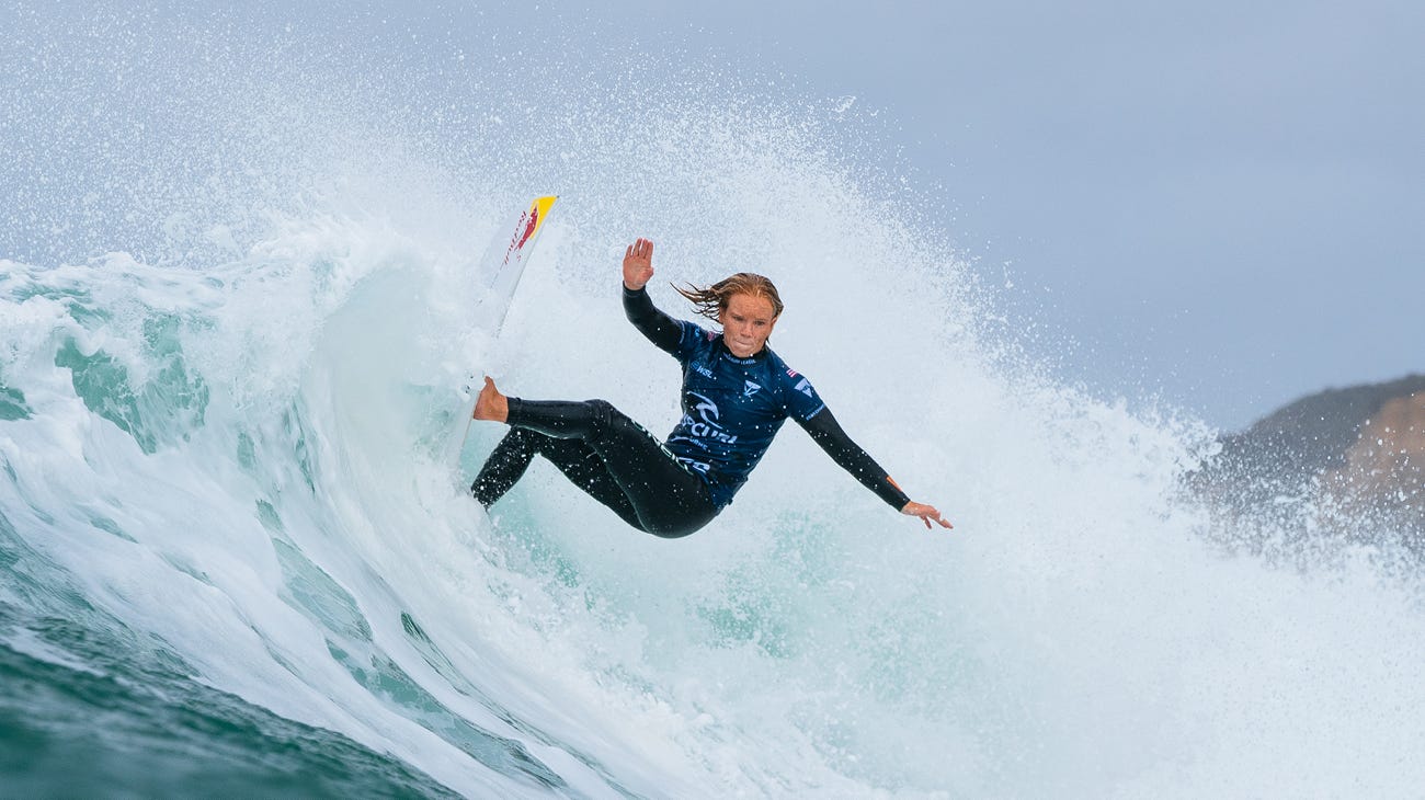 Caitlin Simmers surfing in her winning heat