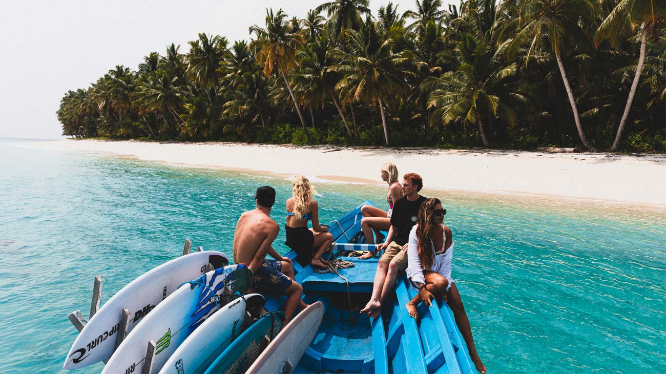 Crew sitting on a boat in the Mentawais 