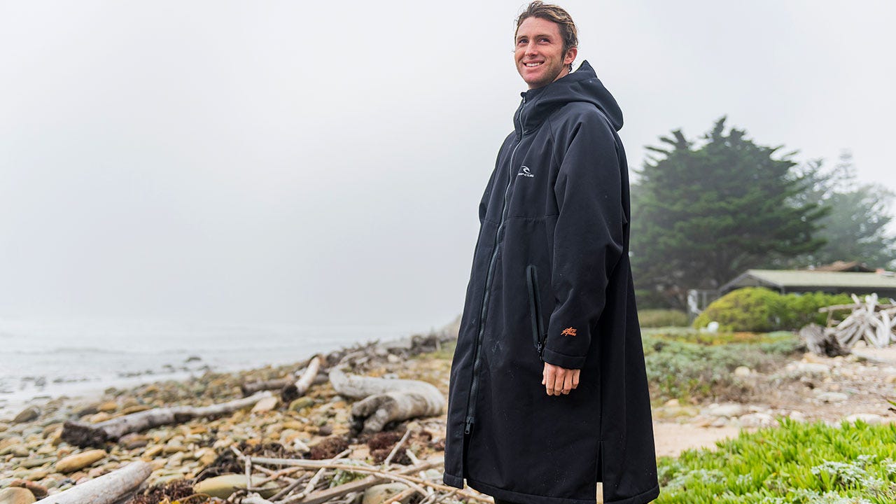 Crosby Calipinto wearing a Rip Curl Hooded Anti-Series Poncho