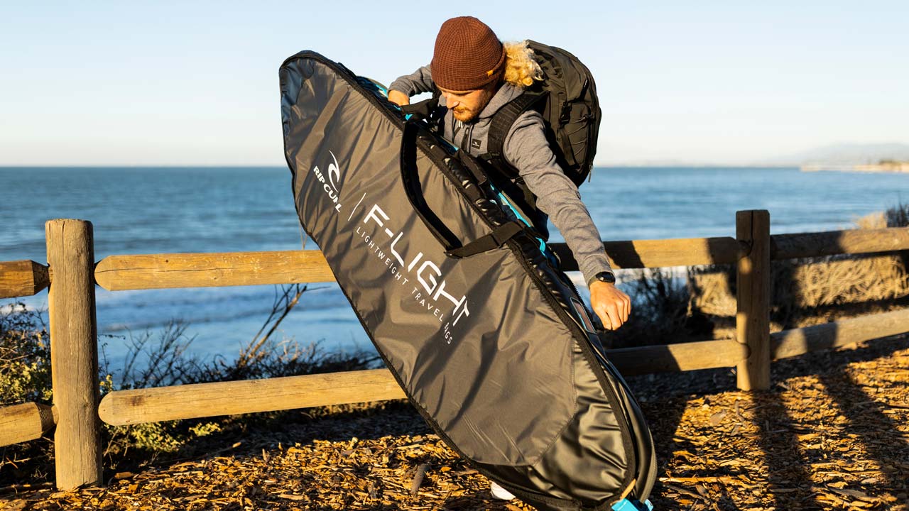 Rip Curl crew packing his board into a F-Light Surfboard Bag