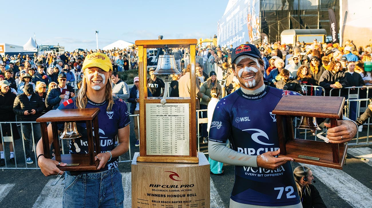 Winners Isabella and Jack holding their Bells trophies