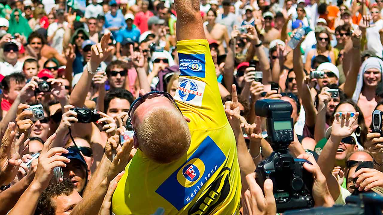 Mick Fanning being chaired up by fans