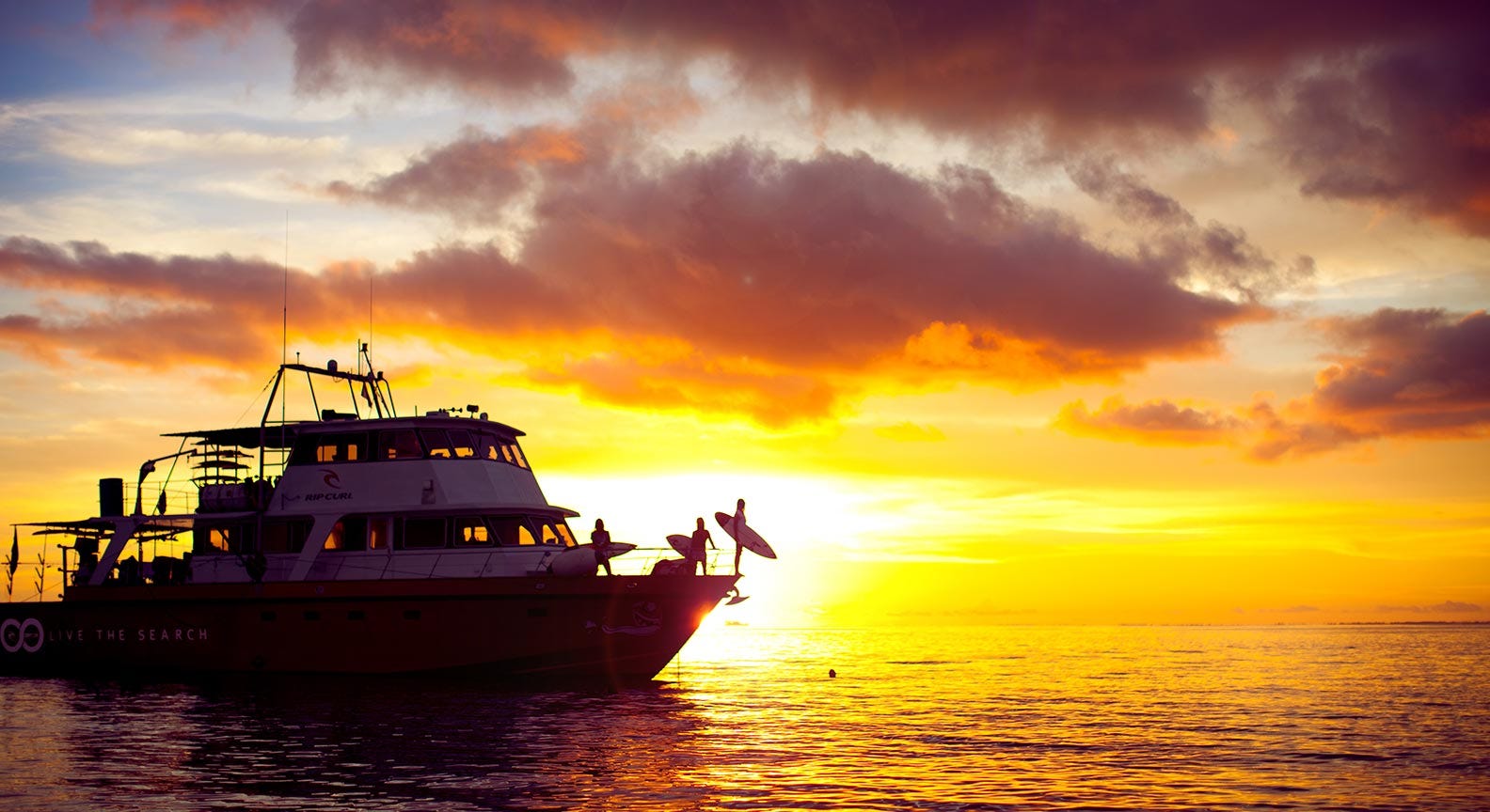 Silhouette image of the Girls boat in the ocean