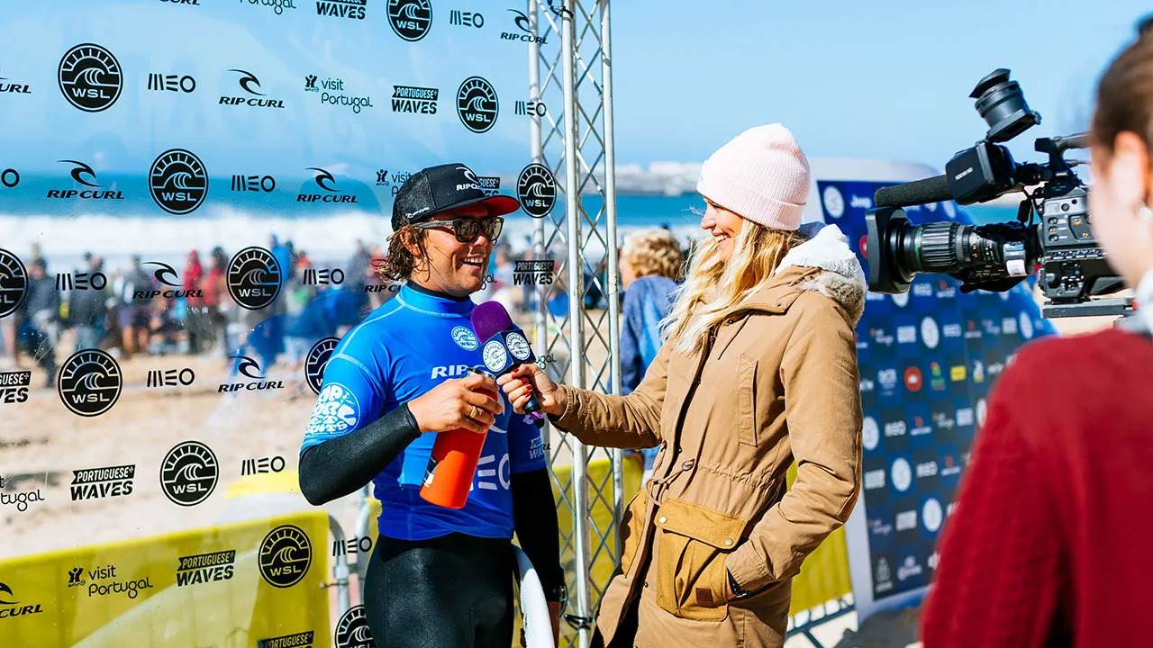 Competitive surfer being interviewed after their heat