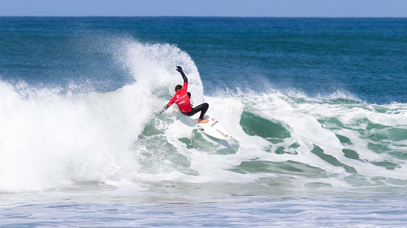 Lachlan Arghyros surfing in his heat at the GromSearch event in Jan Juc