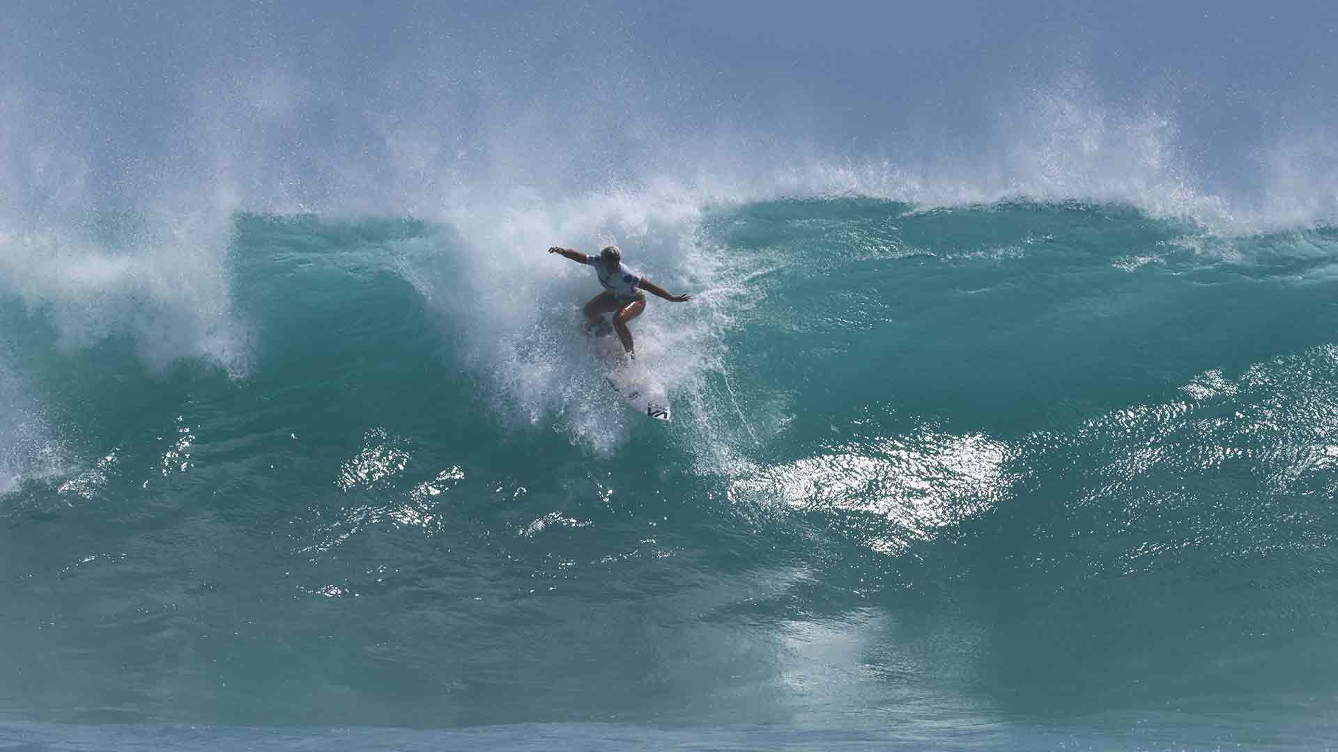 Malia Moana Lima surfing in their heat