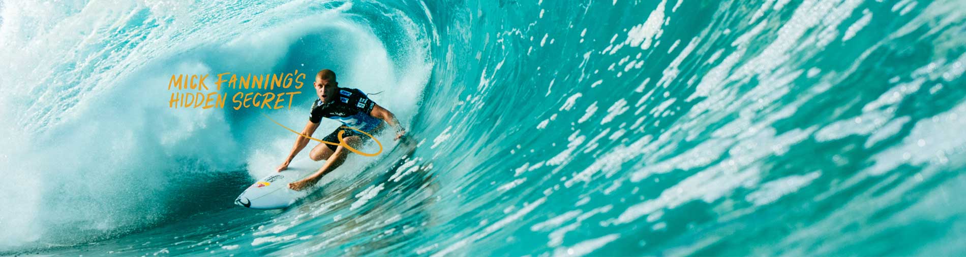Mick Fanning getting barreled with text overlay; "Mick Fanning's Hidden Secret" and arrow pointing to shorts. 