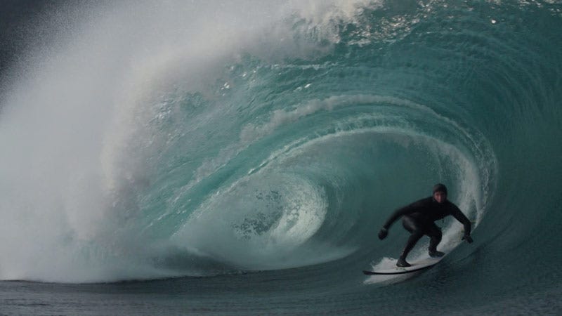 Gearoid McDaid getting barrelled wearing a winter wetsuit