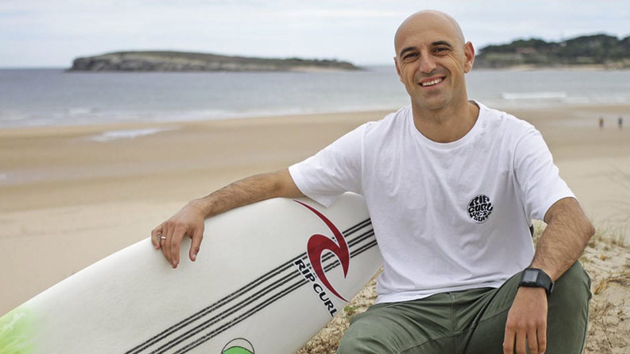 Pablo Gutierrez With his surfboard