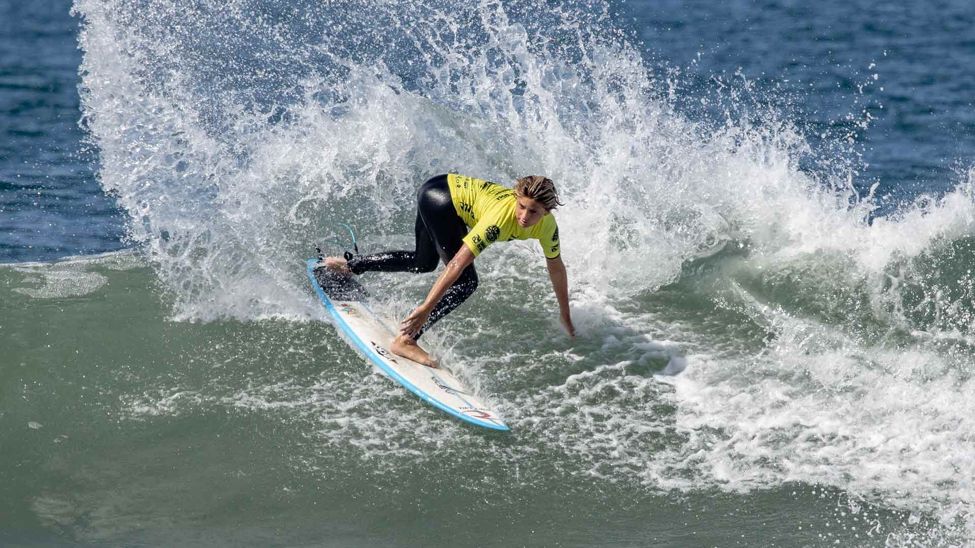 Petey Romaniuk surfing in his GromSearch heat