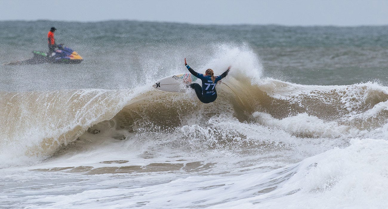 Gabriel Bryan surfing in her finals heat