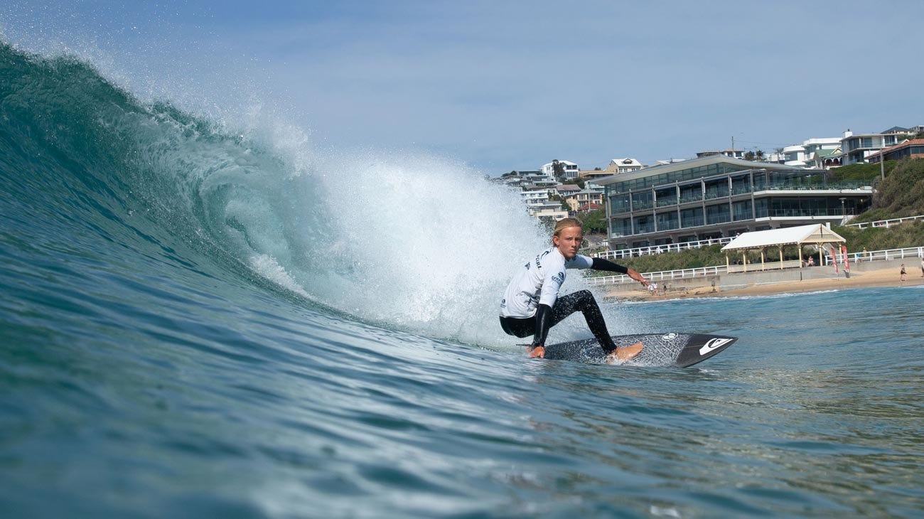 Rip Curl Grom Search contestant surfing in Merewether