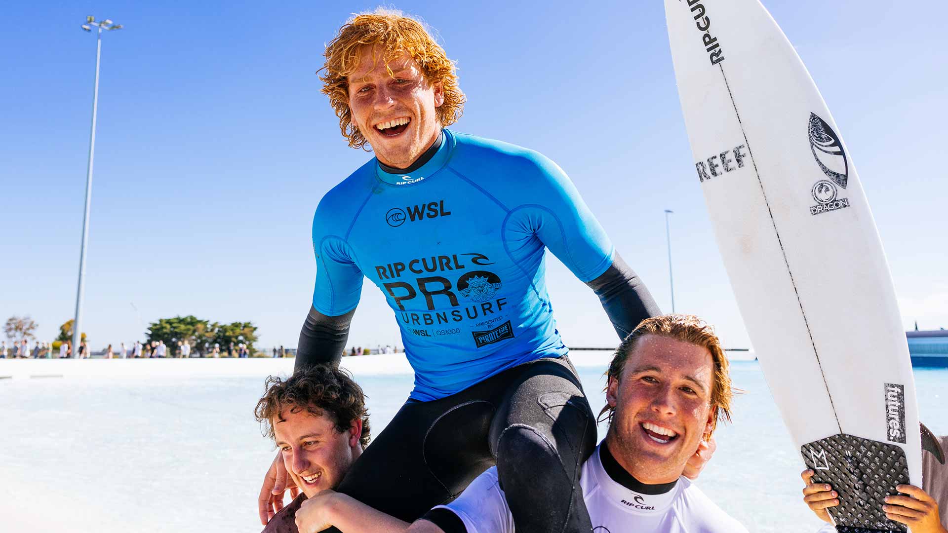 Xavier Huxtable being chaired by friends at URBNSURF QS1000 presented by Pirate Life. 