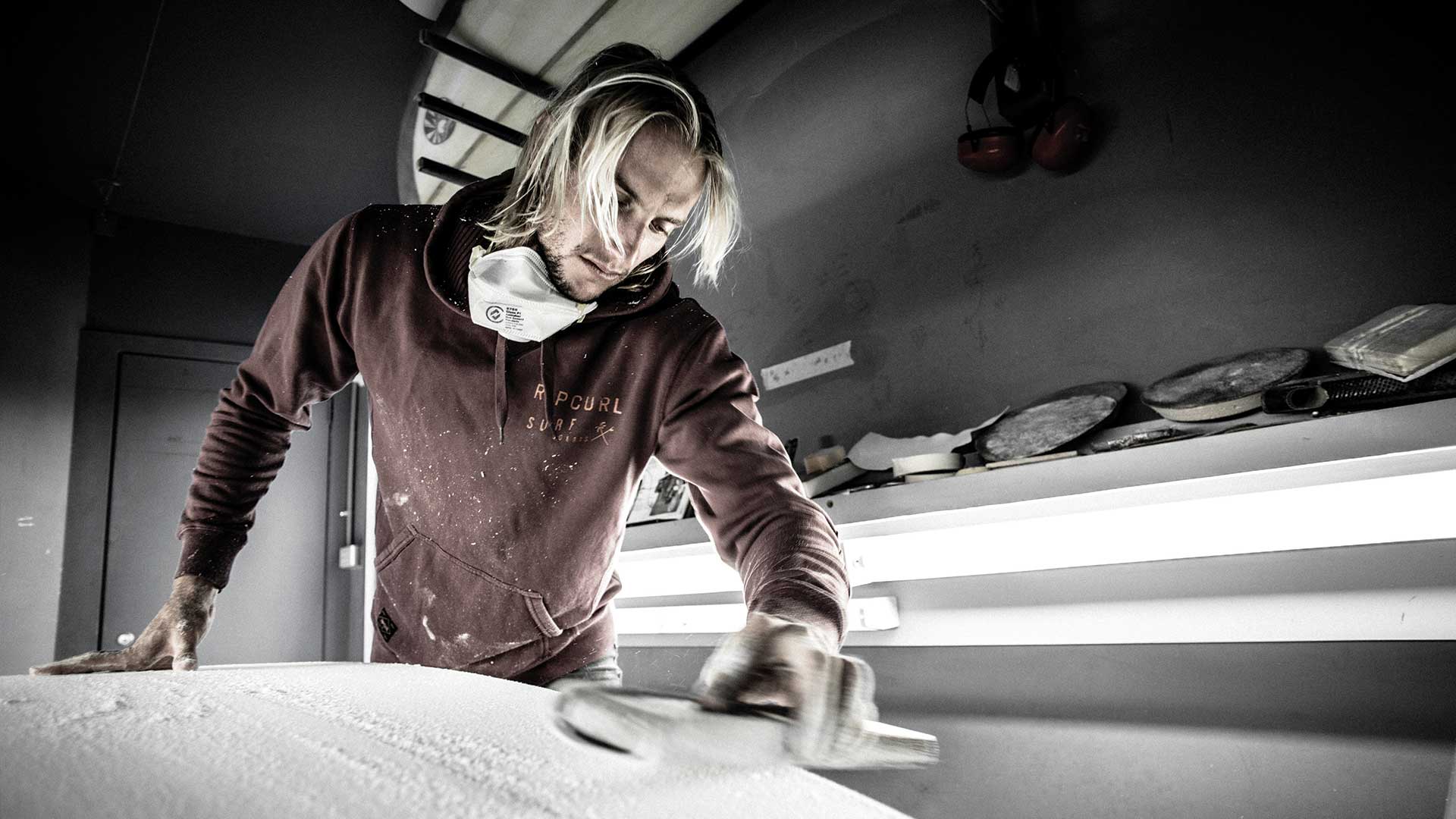 Owen Wright shaping a surfboard