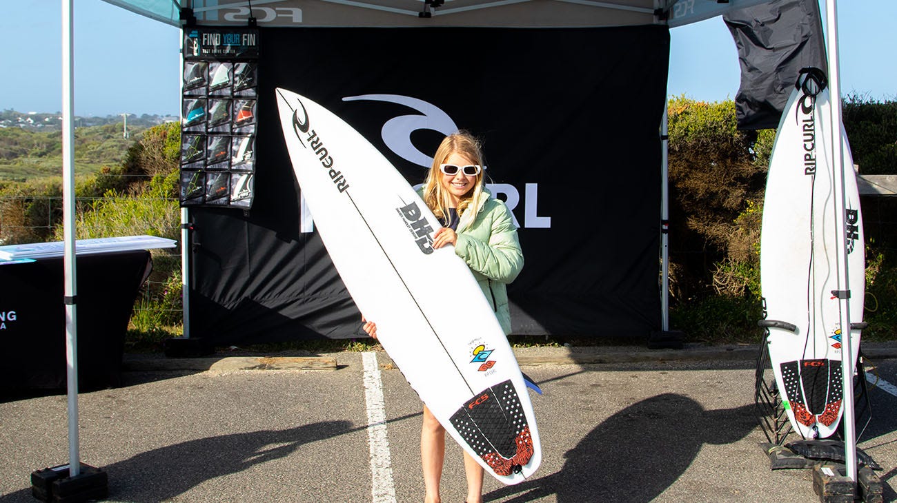 Scarlett Rennie with her new DHD surfboard at the Ultimate GromSearch in Jan Juc 