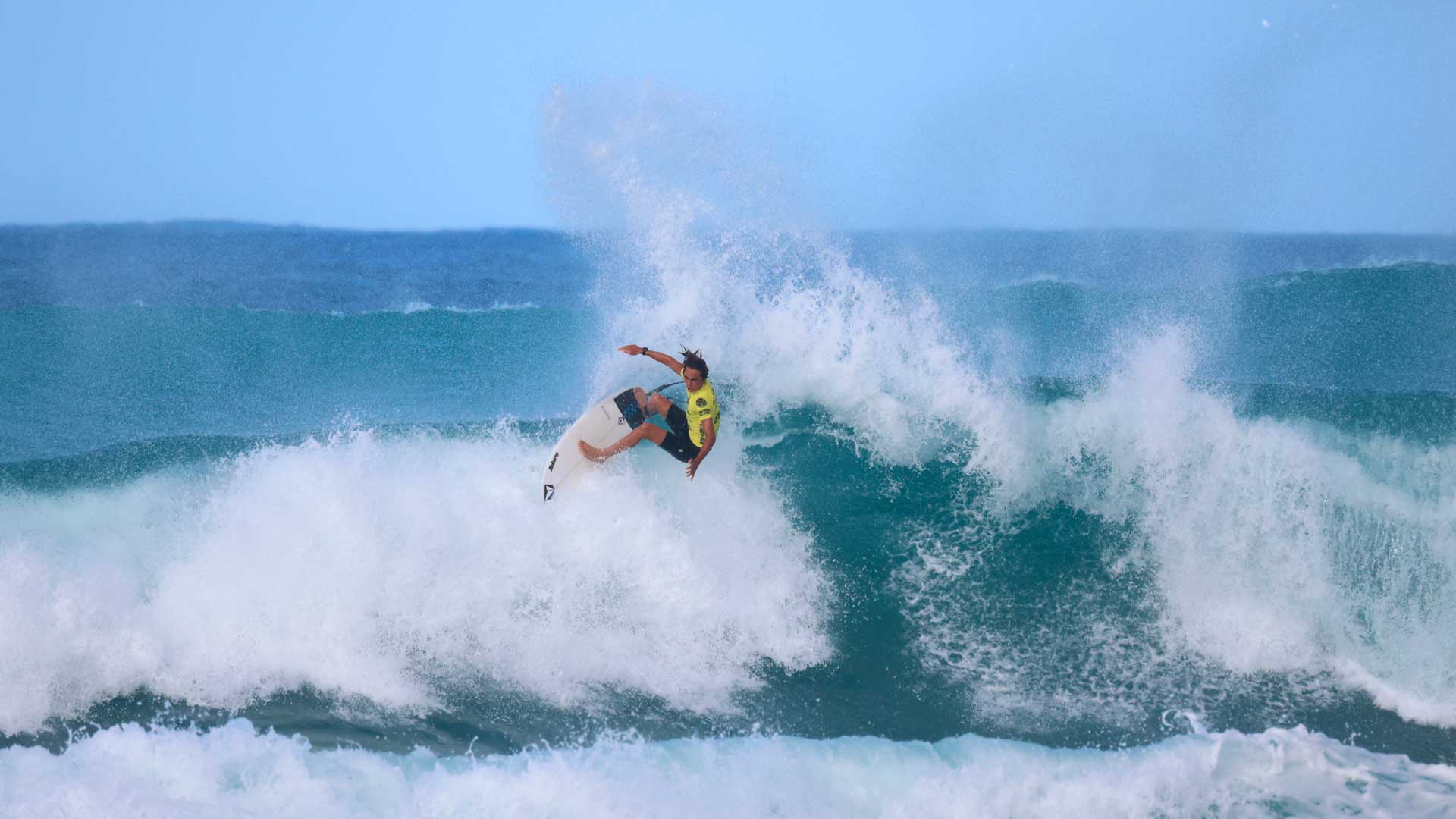 GromSearch entrant surfing in their heat in Hawaii