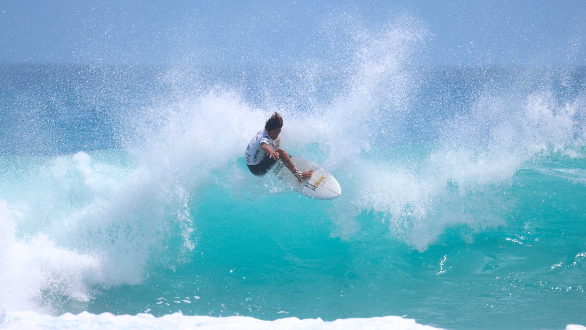 GromSearch entrant surfing in their heat in Hawaii