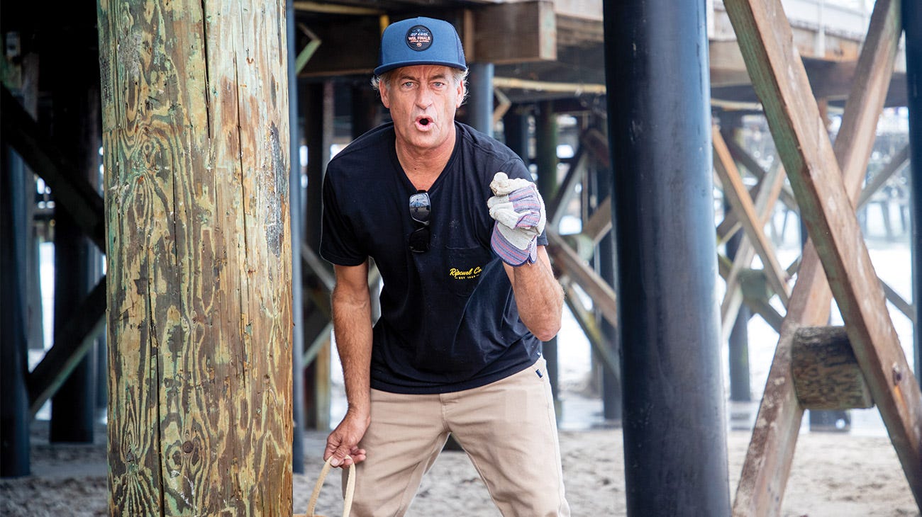 Tom Curren cleaning up at the beach