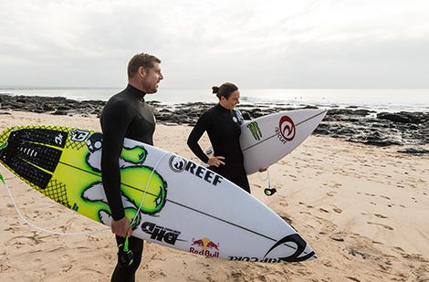 Mick Fanning on the beach with Tyler Wright