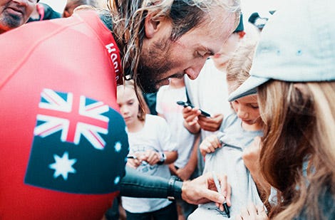 Owen Wright autographing fan merch