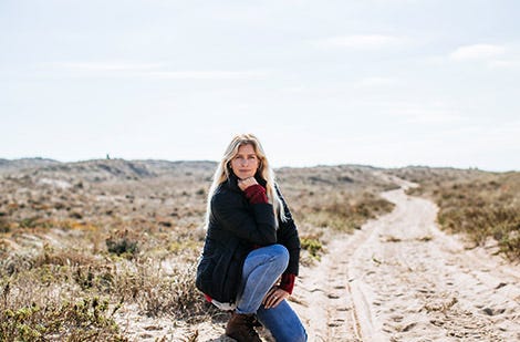 Rosy Hodge posing candidly in the desert