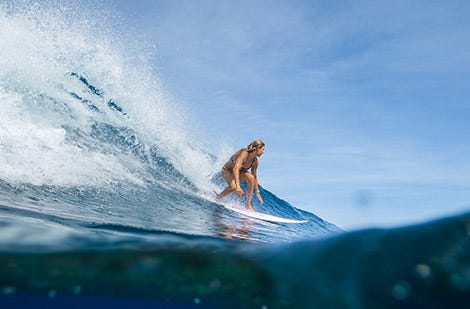 Rosy Hodge surfing for Rip Curl