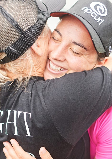 Close up of Tyler Wright hugging her mum