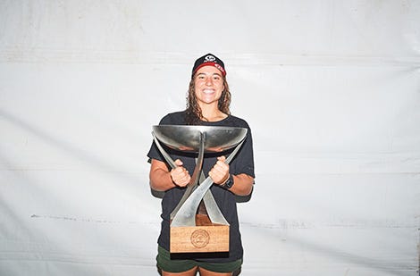 Tyler Wright holding her trophy