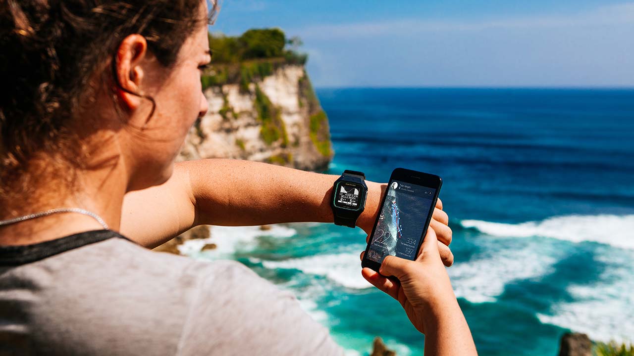 Tyler Wright checking her Tide Watch