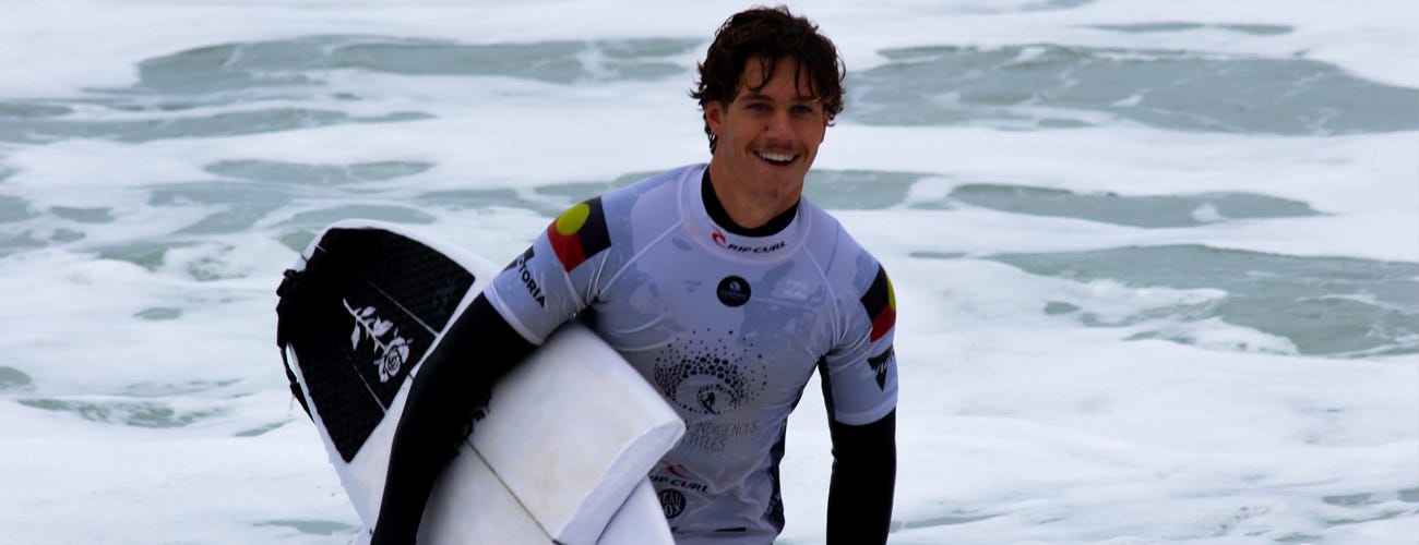 Competitor with a broken board at the Australian Indigenous Titles at Bells Beach