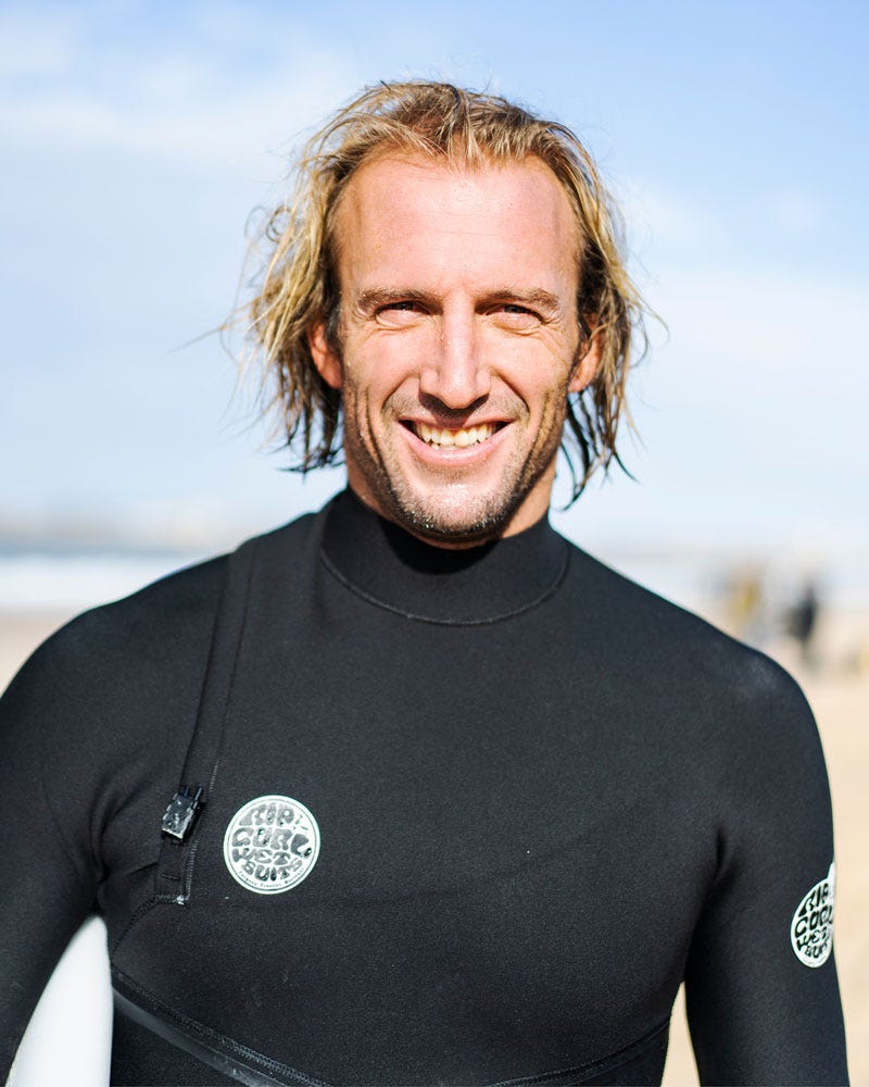 Close up image of Owen Wright in Rip Curl wetsuit.