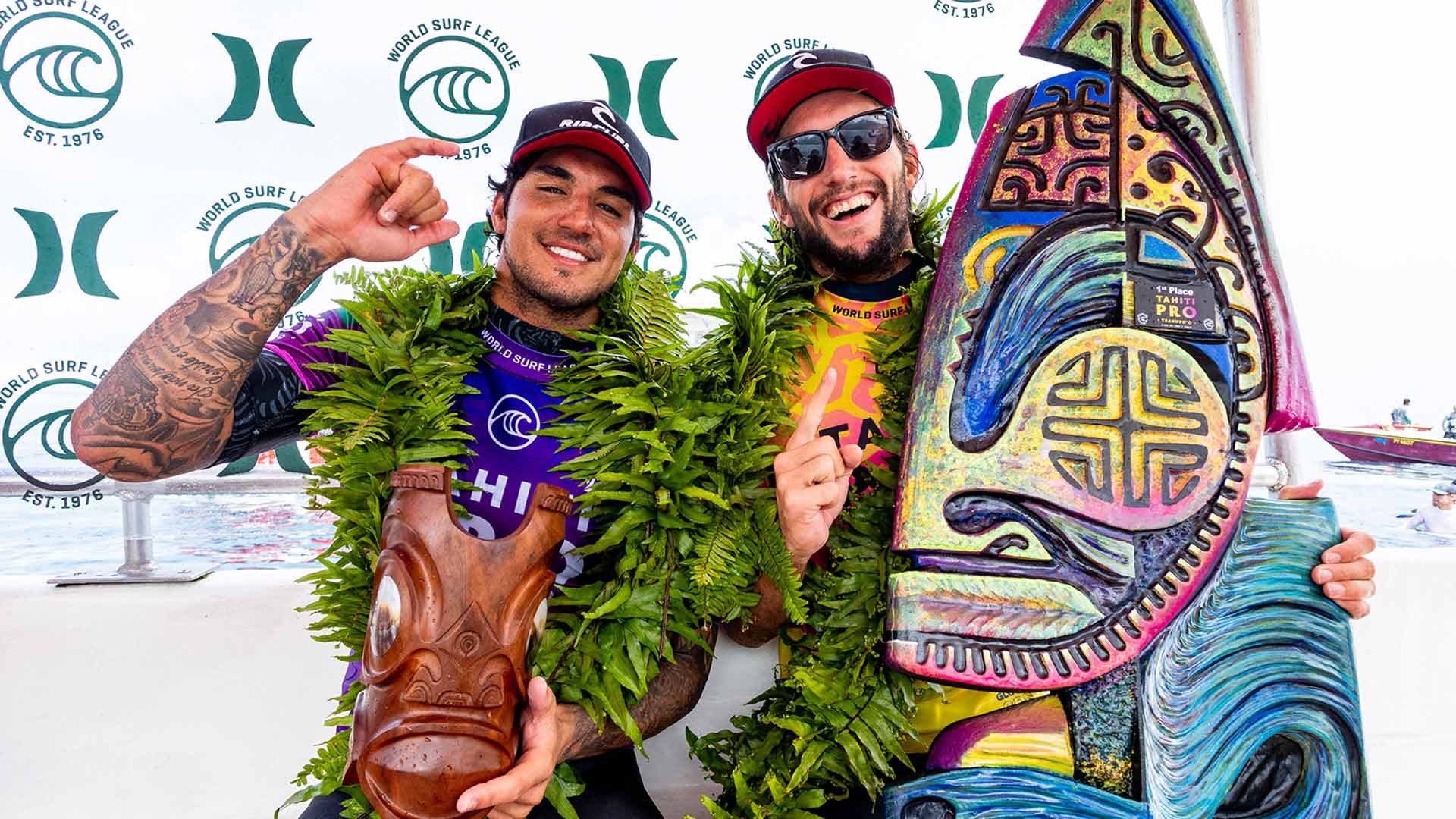 Gabriel Medina and Owen Wright celebrarinf their wins in Tahiti