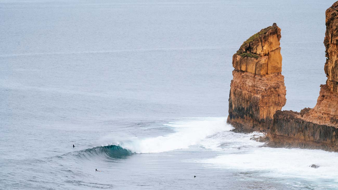 A set of waves and rock cliffs on The Search